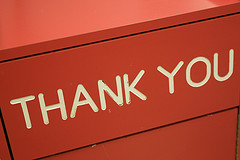 Thank you written on a trash can